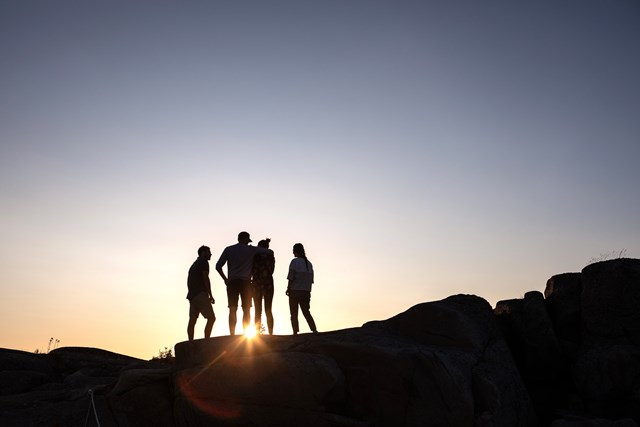 People watching sunset